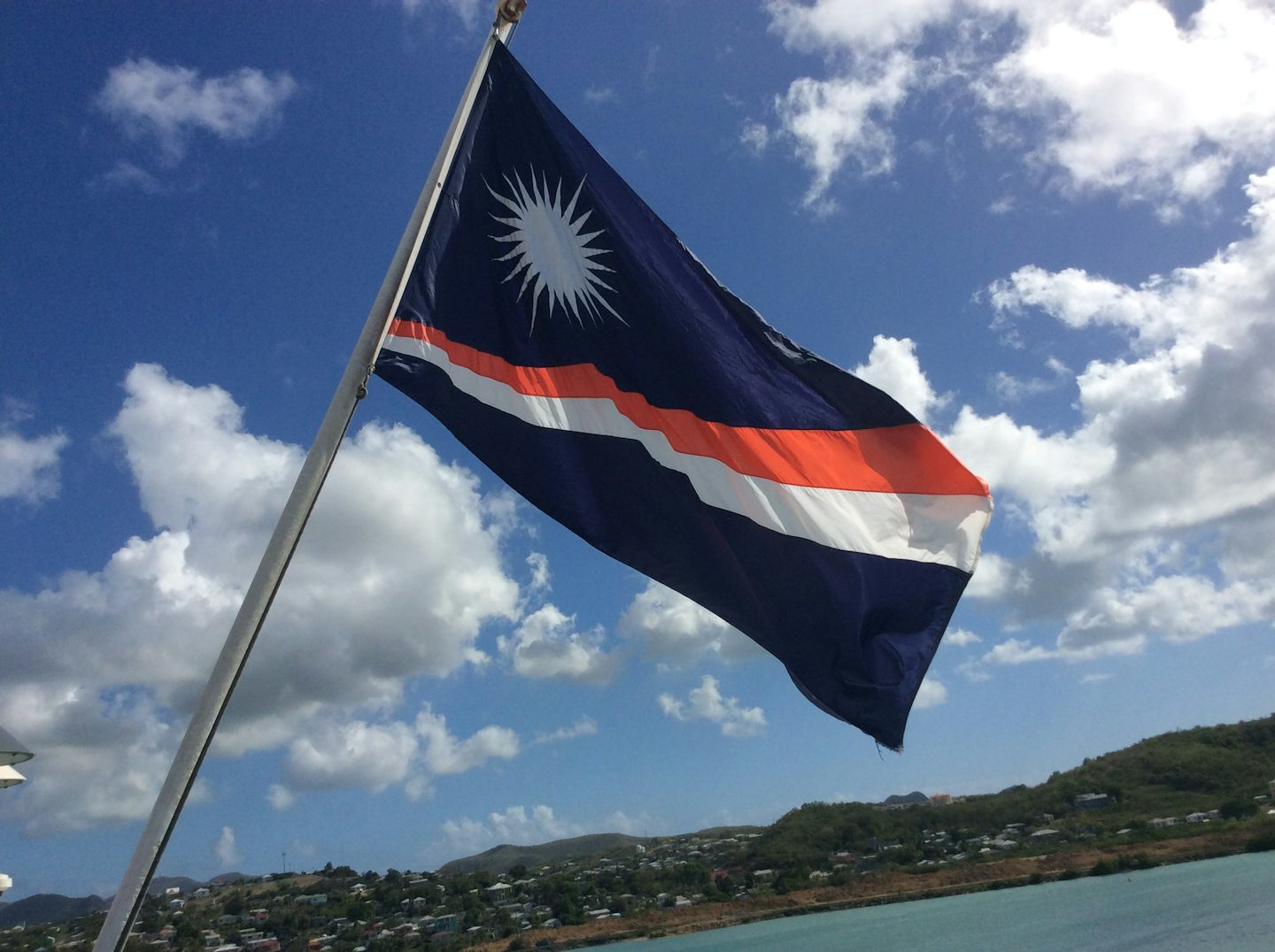The ships registry flag....Marshall Islands