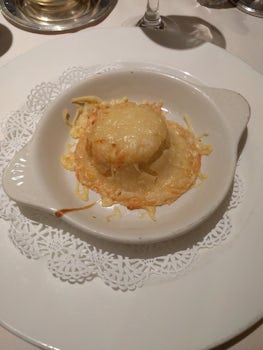 Goat cheese souffle with garlic sabayon.