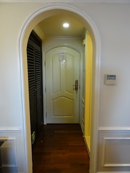 Hallway with closel on the left & bathroom on the right