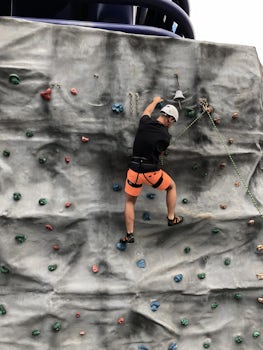 My son rock climbing