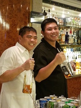 Jeffrey (in black) and Jerry working at the Champagne Bar. BEST BAR STAFF E
