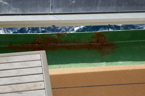The corrosion of the gunwale on my balcony.