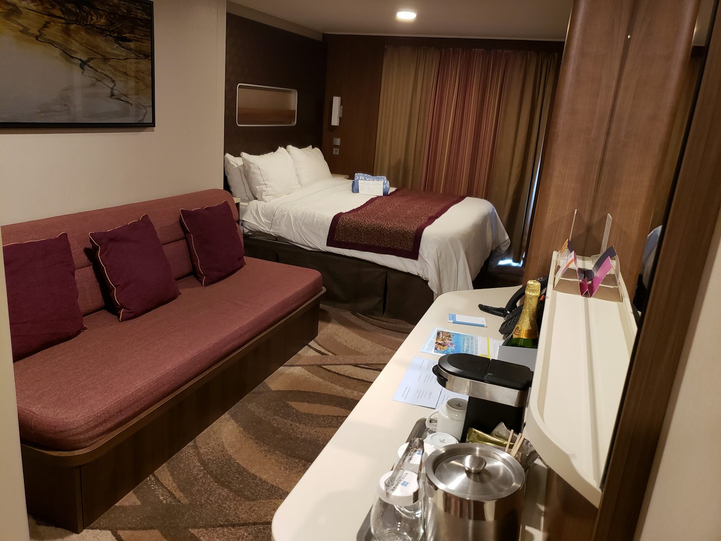 Mini-suite with bed near the balcony which gives more space for getting rea