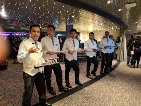 Wait staff serving delicious chocolate treats after 2nd Gala Night dinner -