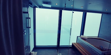Shower and bathtub with windows fogged