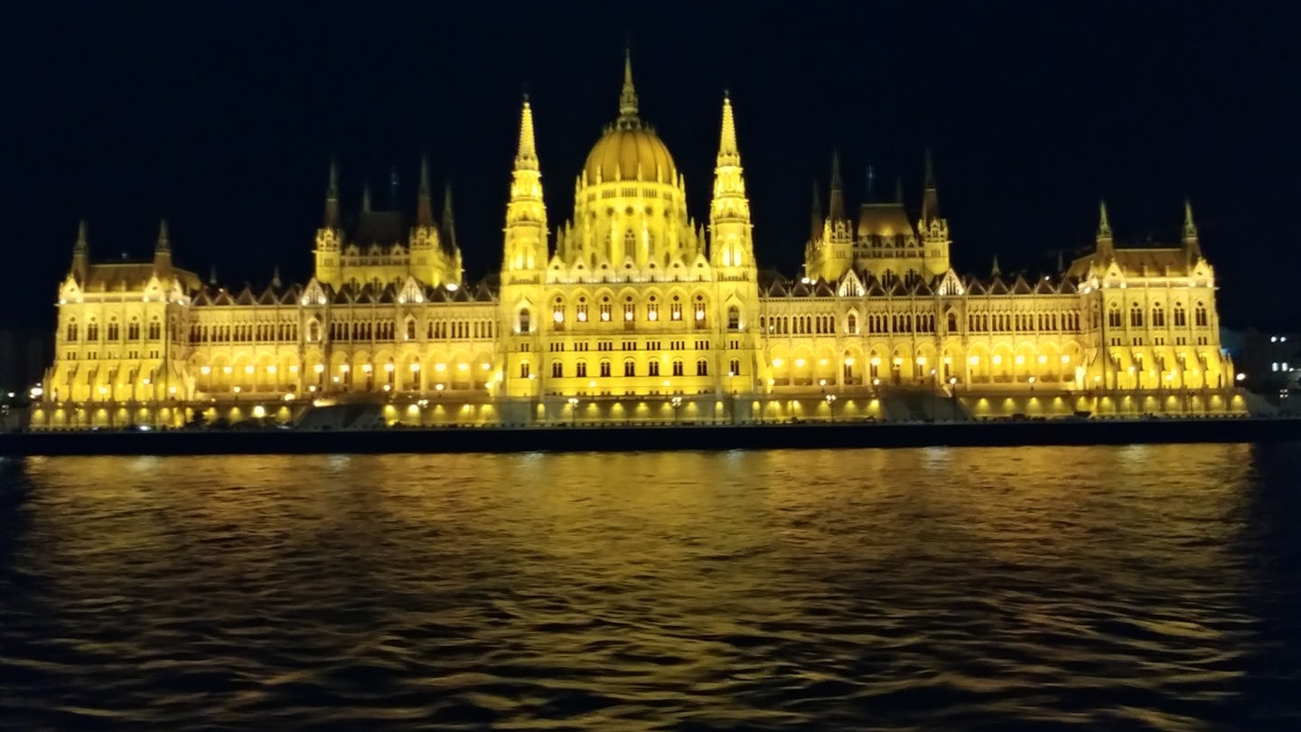 The Parliament building at night in Budapest.