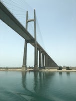 Suez Canal going under bridge