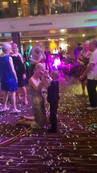 Bobbi (Cruise Director) dancing with my son Danny on Gatsby night - she was