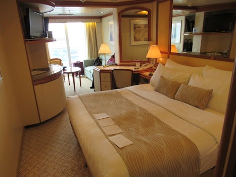 Queen bed in mini suite on Grand Princess