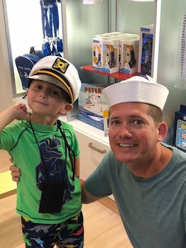 Enjoyed on-board gift shops. Son and grandson sporting caps.