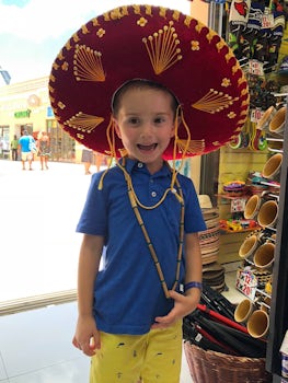 Grandson sporting Mexican sombrero.