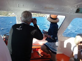 Photographing the ship in full sail from a tender