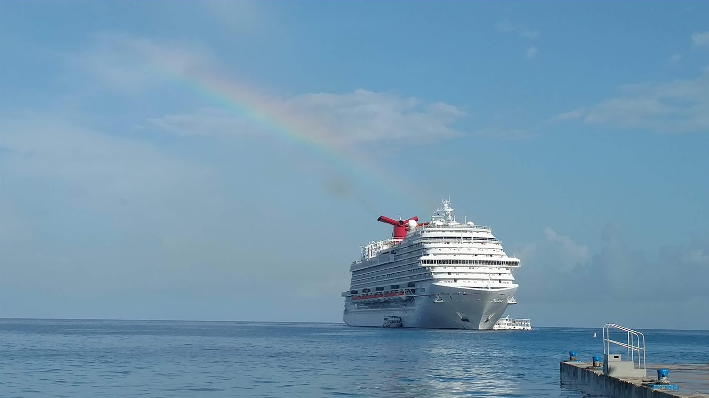 The view of our ship from Grand Cayman. See the rainbow? We knew we were go