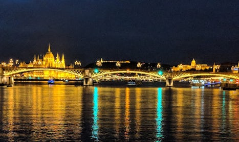 Budapest at night on the water.
