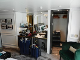 Desk area and closet in stateroom