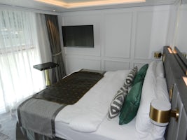 Stateroom bed and panoramic window