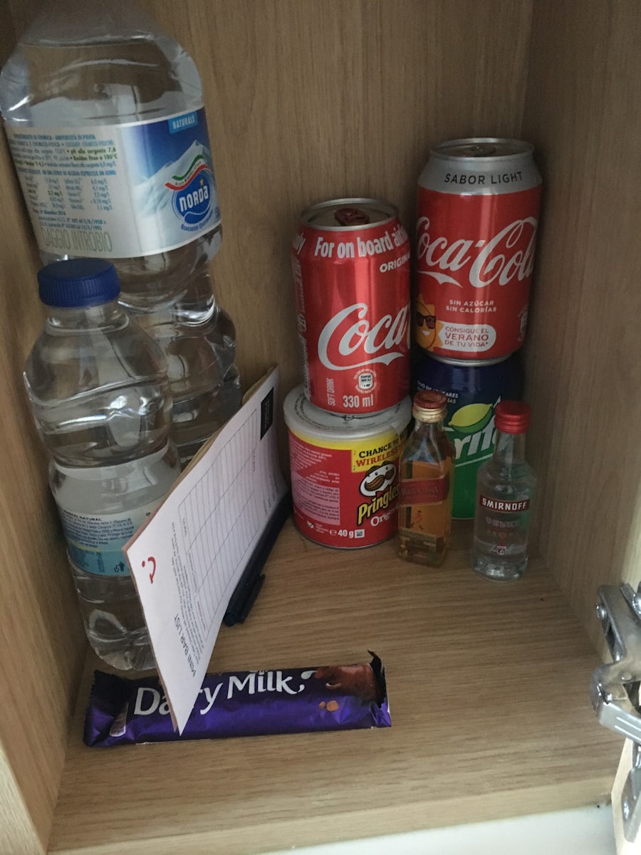 Mini Bar?  Warm drinks + Items located in cupboard (no fridge).
