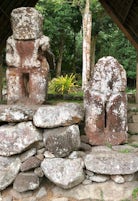 Tikis at archeological site in Hiva Oa