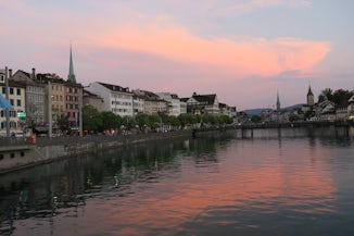 Zurich, Switzerland waterway with sunset light.