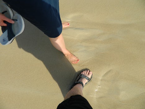 toes in sand at Waikiki.