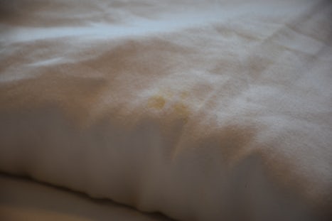 Stain linens. You could find different stains all over the comforter which