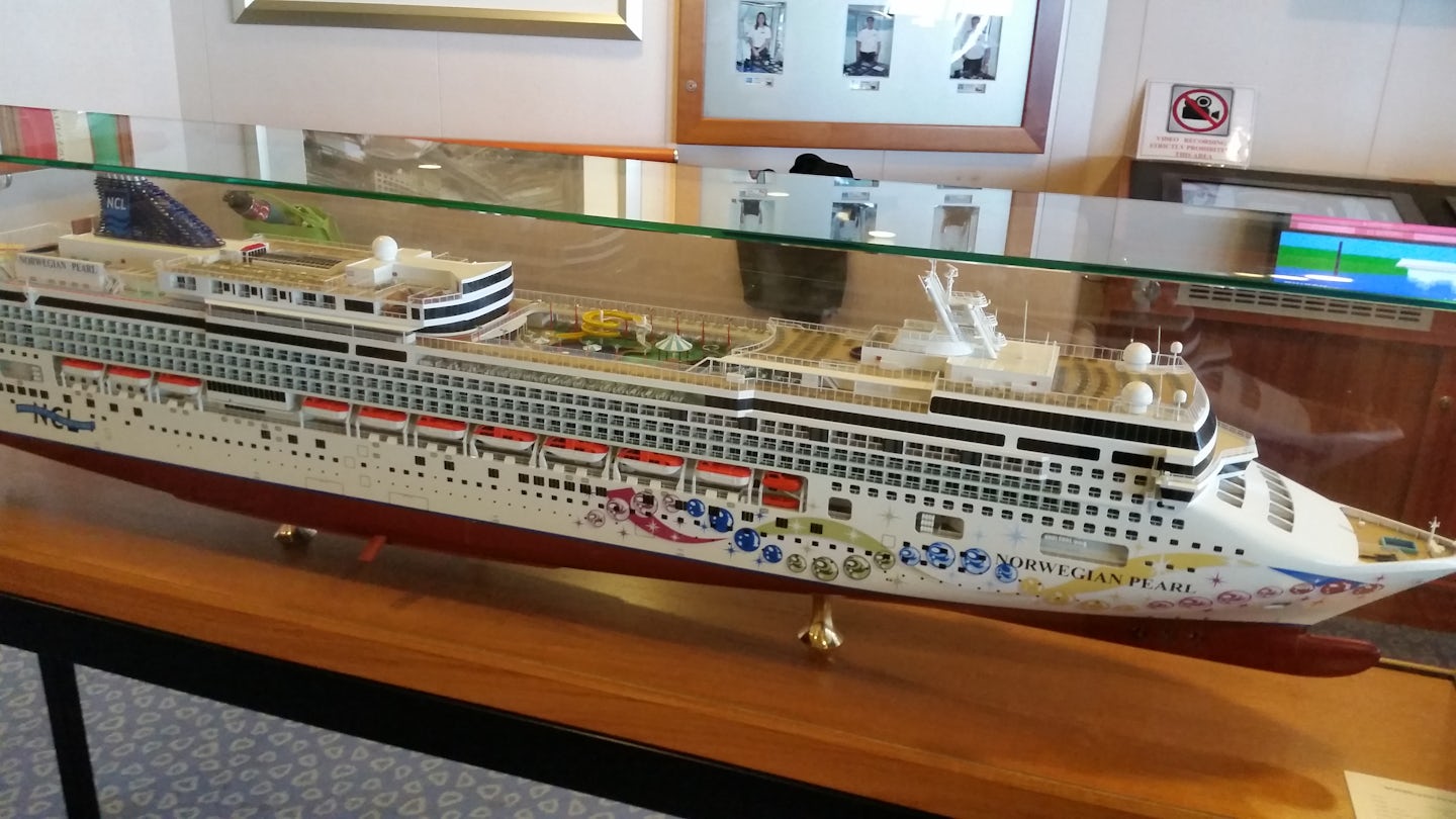 This model of the NCL Pearl is located in the passenger's bridge viewin