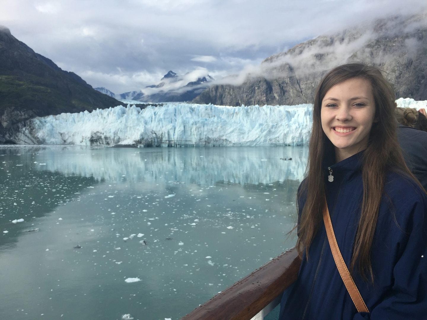 My daughter at Glacier Bay National Park, from our balcony stateroom.