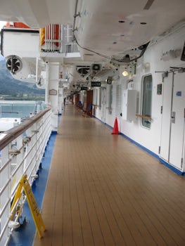 Promenade Deck, can walk all around the ship. There are deck chairs.