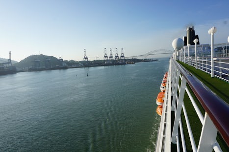 moving through the Panama Canal, with the Bridge of the Americas in the bac