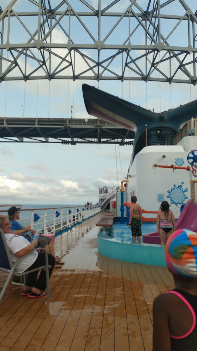 Ship going under the bridge from water play area.