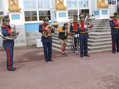me playing drums with the band outside Catherine's Palace as we waited