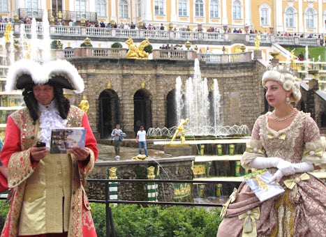 personalities dressed in costumes of 'the times' outside Peterhof P
