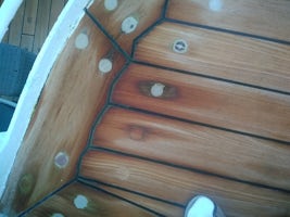Wet rot in the decking fixings.