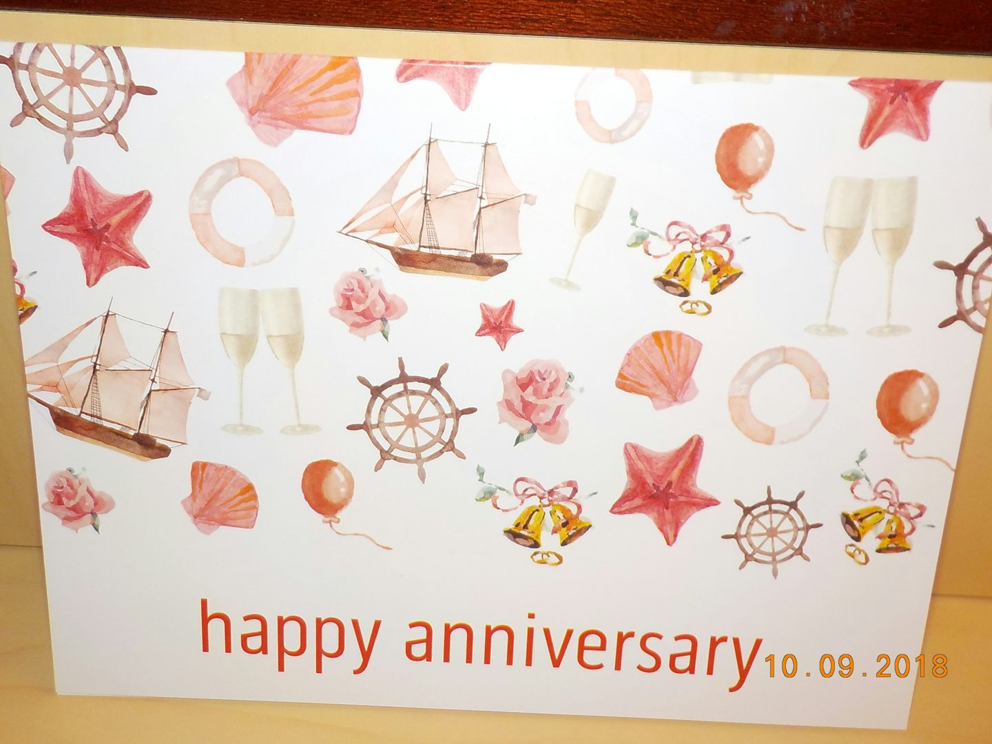 Princess Cruises anniversary poster posted outside cabin door with new logo