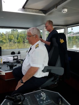 Husband Grant gets special birthday gift- visit with Capt Rolf on the bridge!