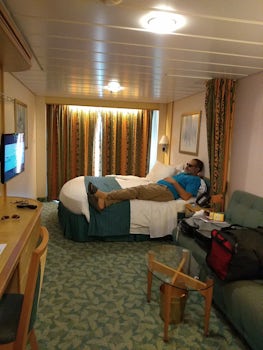 Stateroom 6330. Roomy. Bed, curtains and carpet could stand to be replaced.