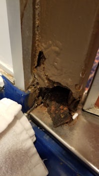 This is a photo of my cabin bathroom. This is a hole and there were others