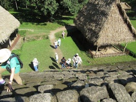 Climbing Mayan ruins at Quiragua.