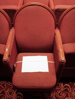 This is one of the seats in the Princess Theatre.  The paper is a standard