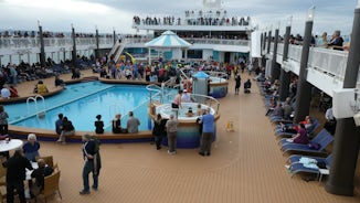 Embarkation high jinks on pool deck.