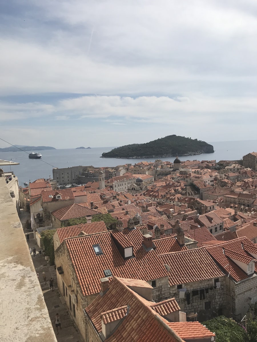 Walking the walls of Dubrovnik with Azamara in the distance.  Tendered port
