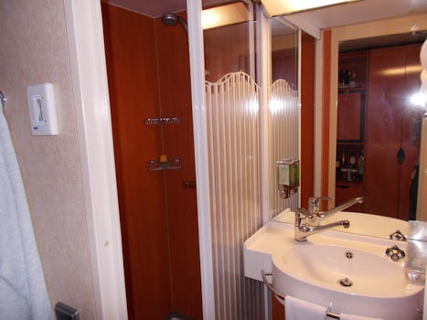 shower on the left, with glass door
