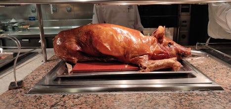 Roast pig at Asian-themed dinner buffet on 2nd sea day