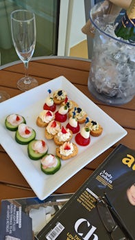 Drinks and canapes on the balcony, part of the romance package available on
