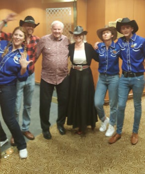 Having fun with the Cruise Director staff during Country and Western night.