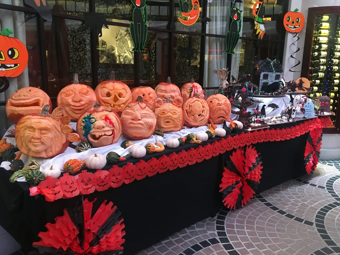 Halloween pumpkin carvings by restaurant staff.