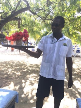 Our cabana server.  His name is Rolex!  He brought flowers for my sister’