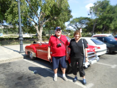 Us in front of our 53 Chevy convertible.
