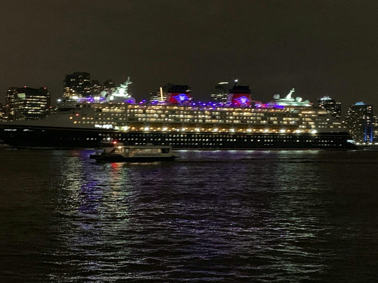Photo of the Disney Magic leaving New York on the Hudson River