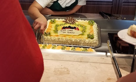 Welcome cake on the buffet for embarkation.